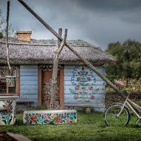 Zalipie flower painted decorated houses well bicycle